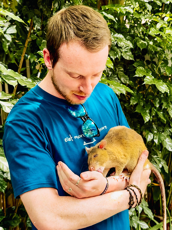 Matt holding a Hero Rat at the APOPO Visitor Center in Siem Reap, Cambodia