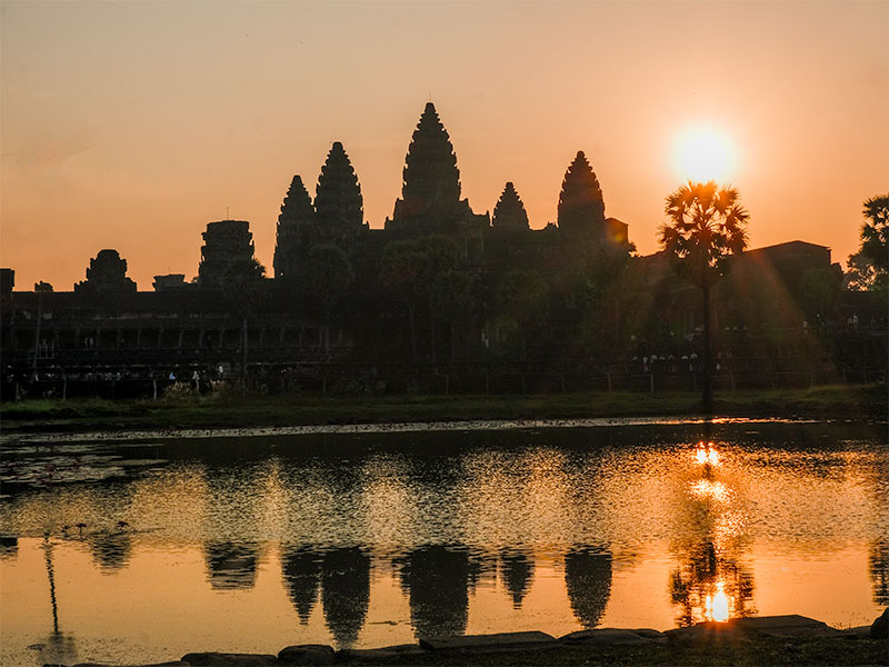 The sun rising directly behind Angkor Wat, Cambodia