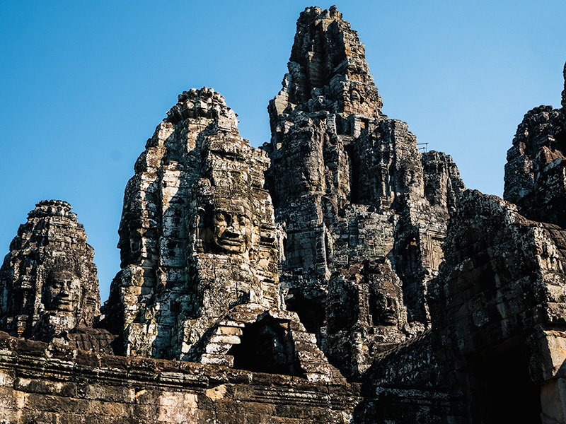 Close up of the many carved stone faces of Bayon Temple, Siem Reap